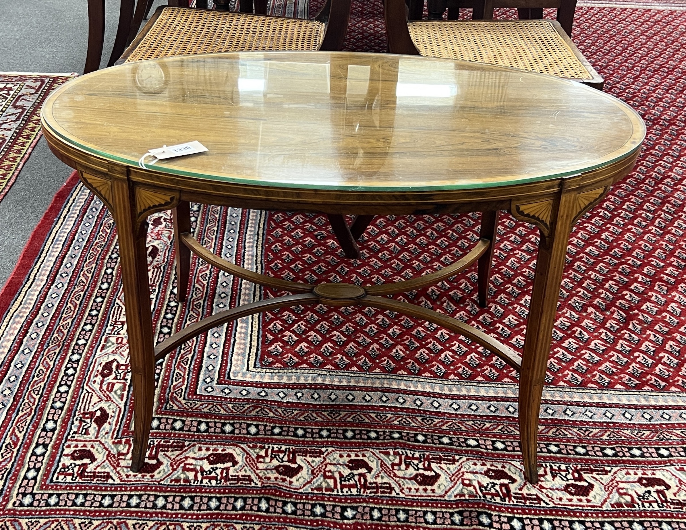 An Edwardian Schoolbred & Co. oval banded rosewood low occasional table converted from an etagere, width 88cm, depth 55cm, height 50cm